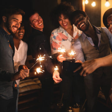People holding sparklers