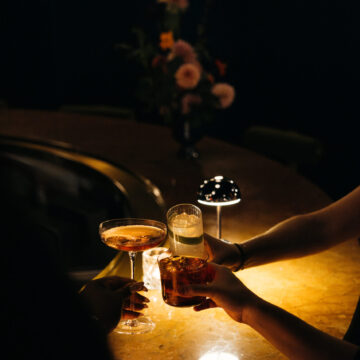 Drinks in dark light at MayPeel cocktail bar